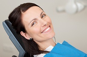 Smiling woman in dental chair