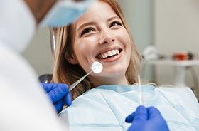 Smiling woman in dental chair