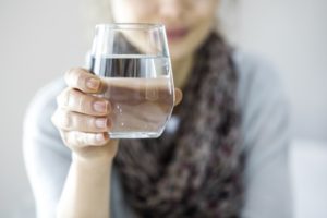 Drinking water to fight dry mouth in Plymouth