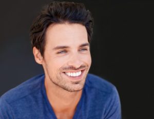 Handsome, smiling man with bright white teeth