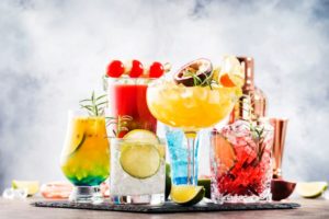 Colorful cocktails arranged on tabletop