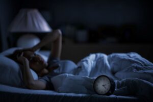 Woman struggling with poor sleep